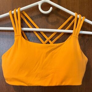 Athleta Hyper-Focus sports bra. Soft orange, size S.